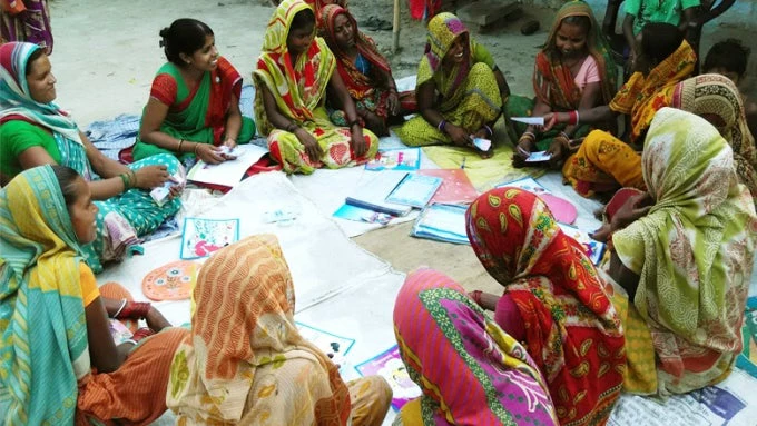 SHG women sitting in a circle