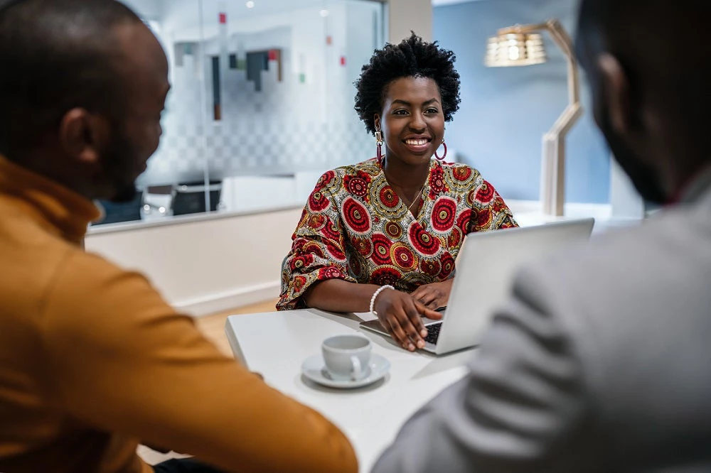 African business woman financial bank adviser in meeting with customer.