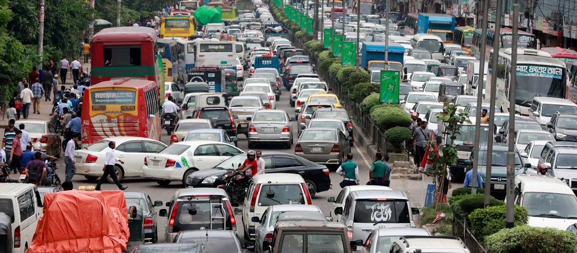 Numerous vehicles jam on a street in Dhaka