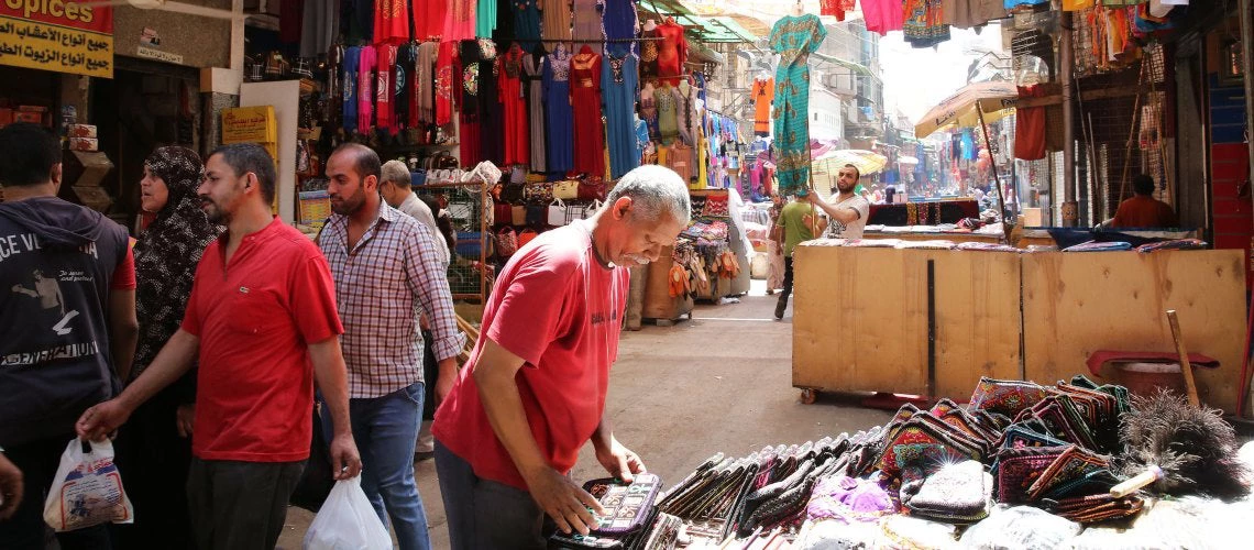 City shots of old Cairo as shop owners get ready for another day of work