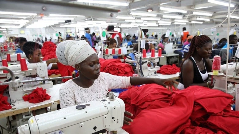 Dignity factory workers producing shirts for overseas clients, in Accra, Ghana on October 13, 2015