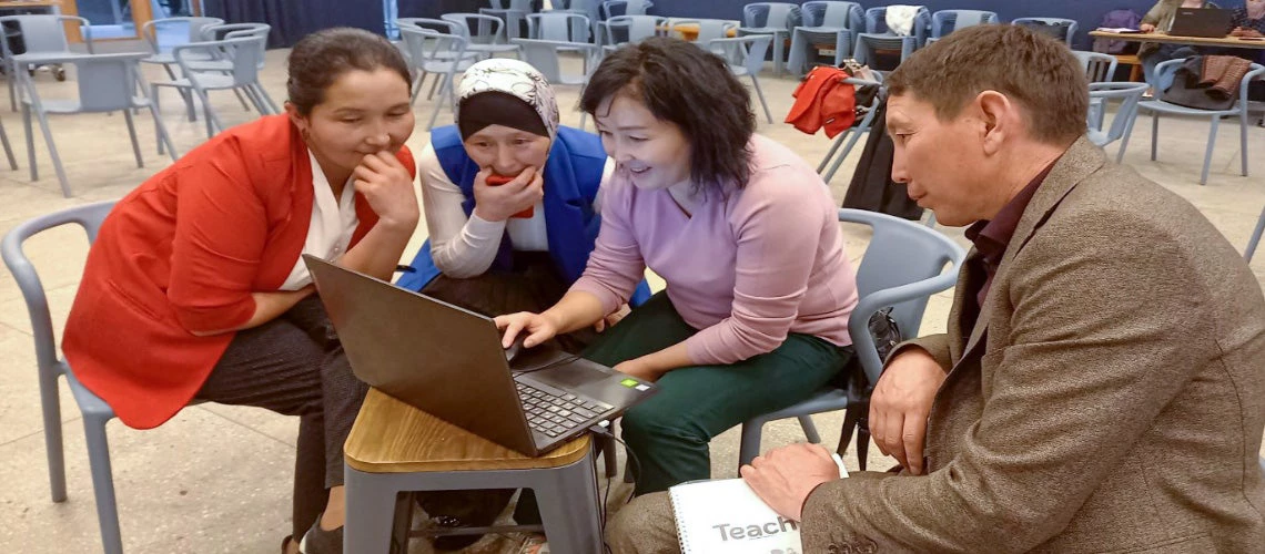 Kyrgyz teachers collaborating during a session with the Mentor Training Program