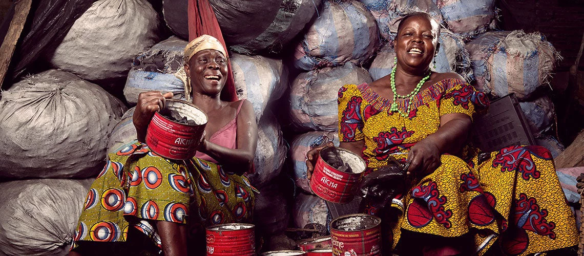 Atatti and Loumonvi sell charcoal in the streets of Bè-Ablogamé. Photo: Stephan Gladieu / World Bank