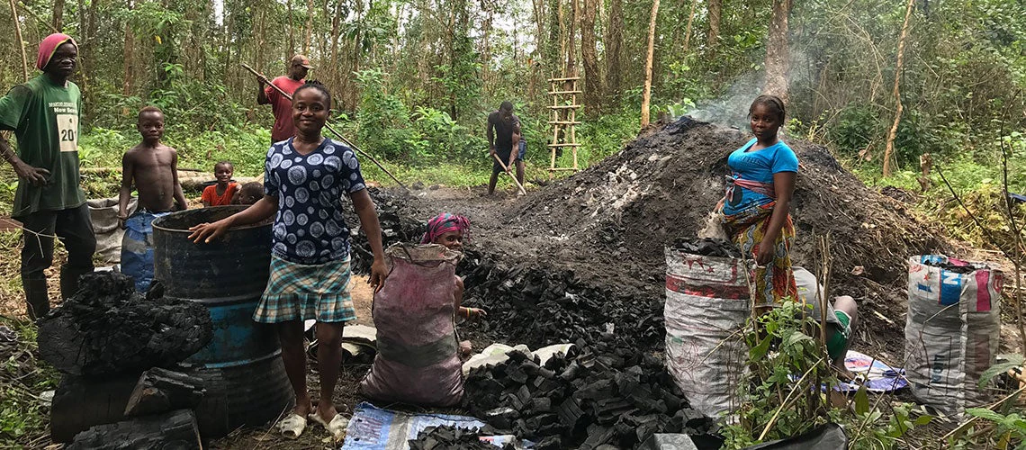 Women working in the forest in Liberia. Here, forestry is the fourth largest contributor to the economy after services, agriculture, and fisheries, mining, and panning.