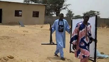 moving a low-cost portable interactive whiteboard -- over rocks and sand -- between classrooms