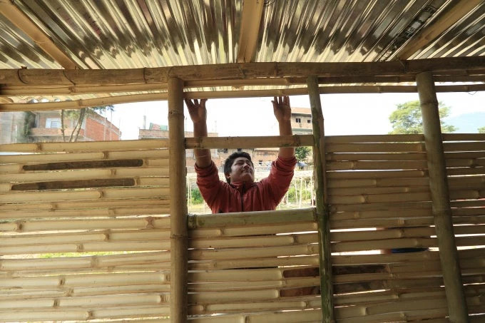 Nepali man constructs bamboo house
