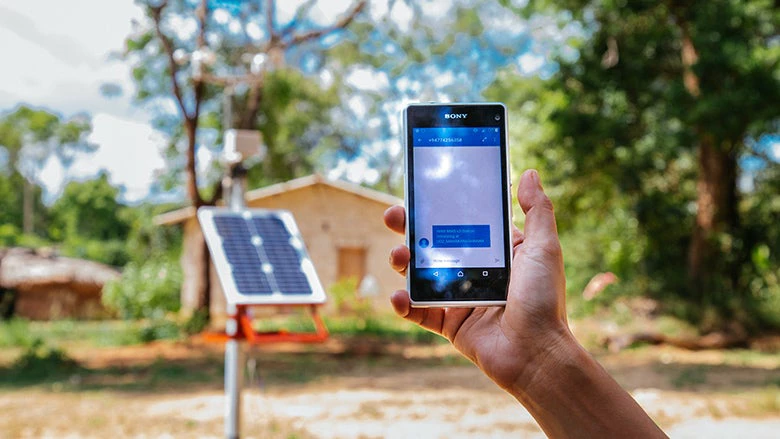 Challenge funds can help harness technology for development ? here, a team from the international Water Management Institute (IWMI) shows off an open source mobile weather station developed for the GFDRR/DFID Challenge Fund. © IWMI 