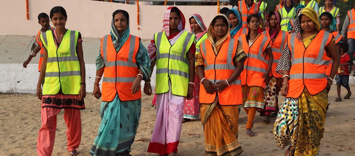 Odisha women wearing disaster management vests