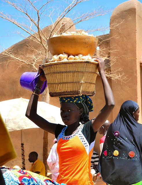 A woman brings onions to market in Mali. Photo - Irina Mosel / ODI via Flickr Creative Commons