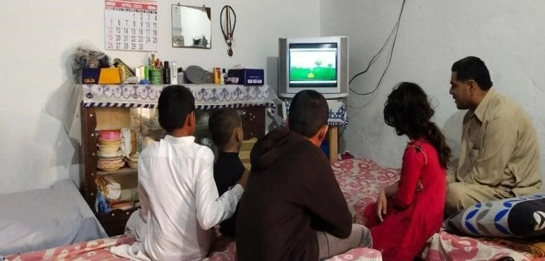 Pakistani children in the province of Punjab watching education TV lessons via Taleem Ghar during the COVID-19 pandemic based school closures. Photo: Taleem Ghar