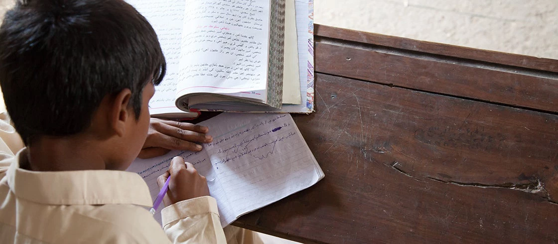 A boy studying in Sindh, Pakistan. Photo - razum / Shutterstock.com
