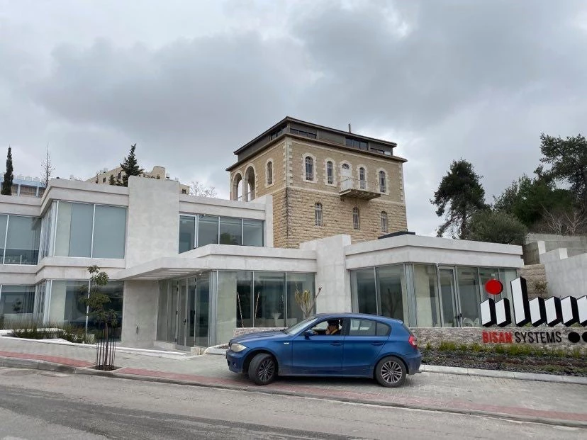 A car is parked in front of a Palestinian software company in Ramallah