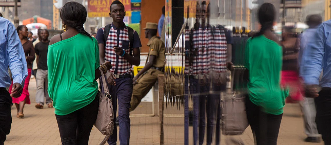 People walking in the street?Uganda. | © Sarah Farhat/World Bank