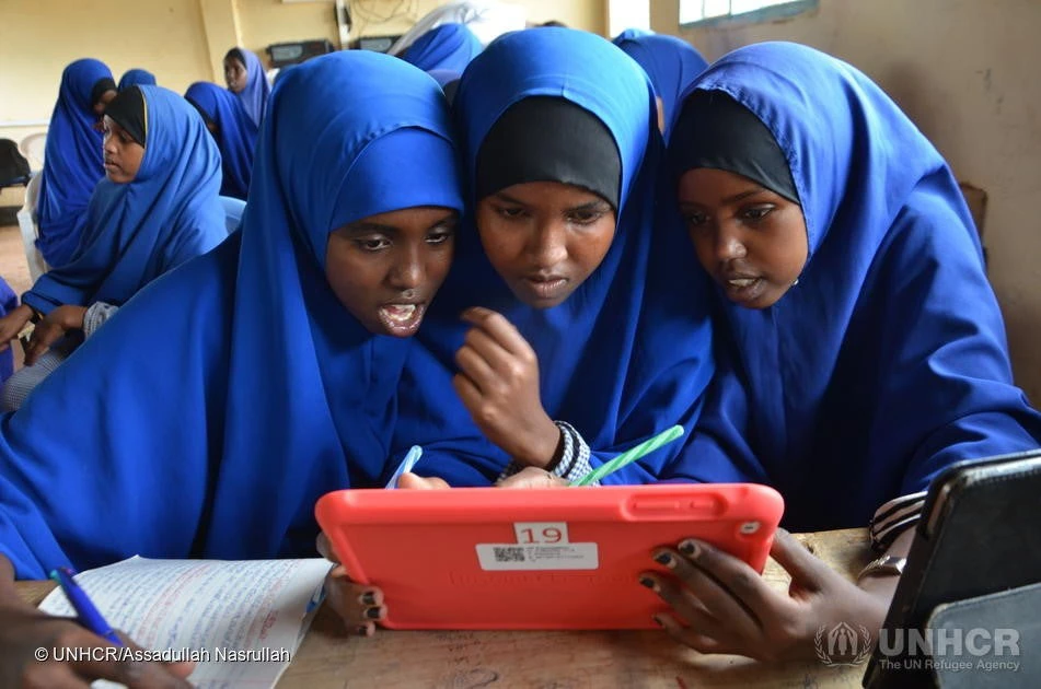Girl students using tablets pre-loaded with educational software at their Instant Network Schools (INS) classroom in Juba primary school, Dadaab.&nbsp;© Assadullah Nasrullah/UNHCR