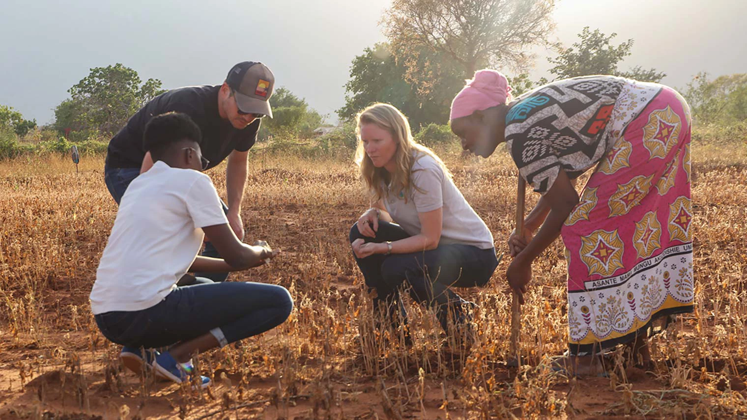 Pula’s Rose Goslinga meets with farmers in Kenya.