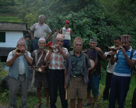 Rural people celebrating commissioning of a MHP in their village