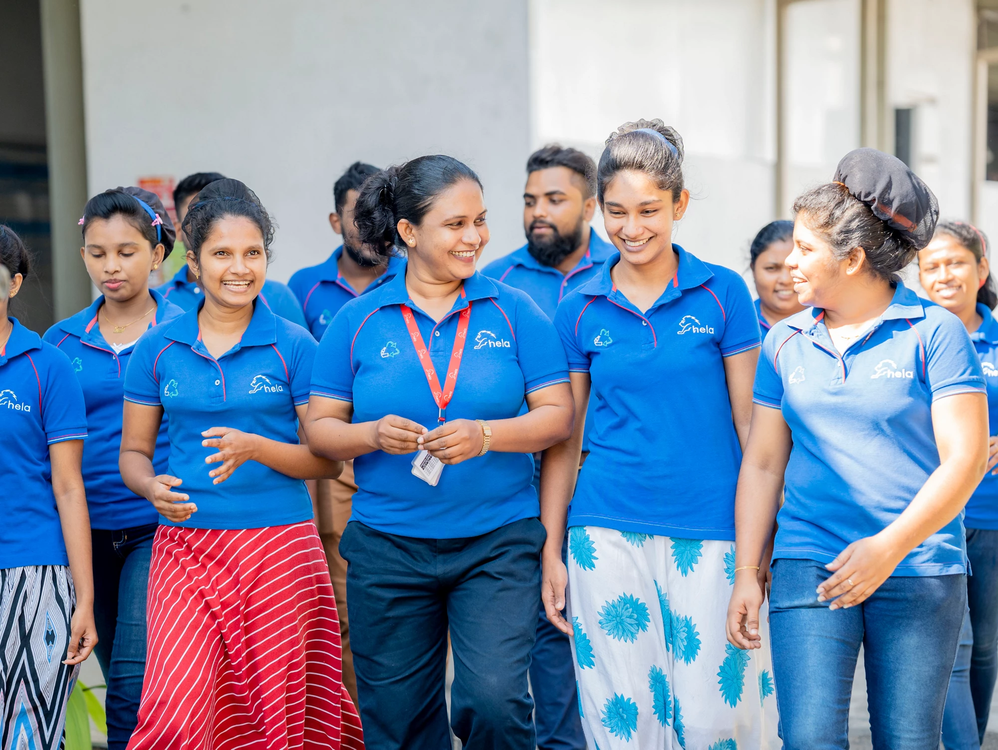 Sarojini Thusharika Kumari with her colleagues at Hela Apparel Holdings. Photo: Capture Eye
