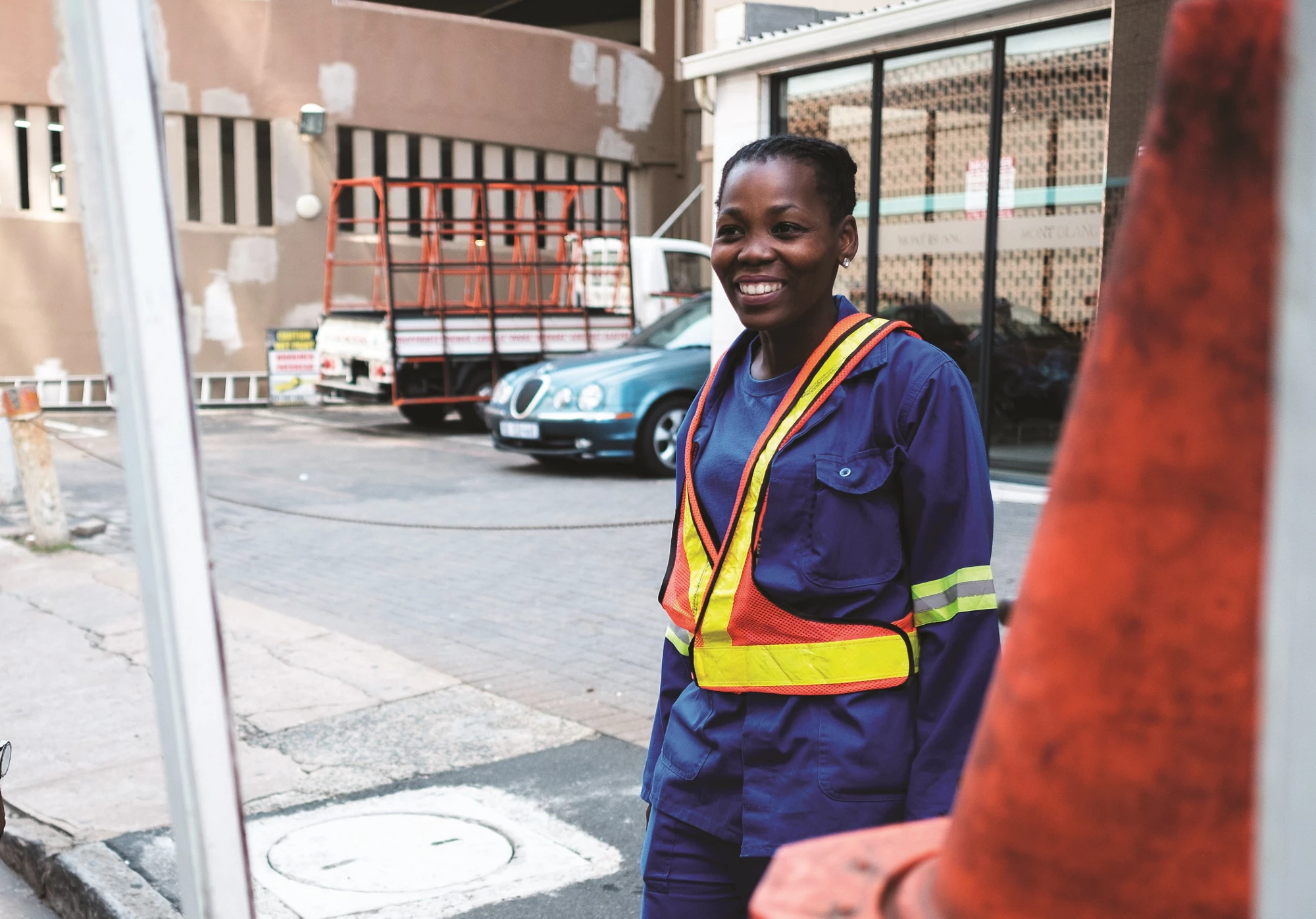 Senzi Dumakude, a member of an eThekwini Municipality sewage blockage crew at work in Durban. Her team uses flexible rods to clear blockages in pipes leading to the main sewer lines in South Africa, March 2019. © WaterAid/Nyani Quarmyne