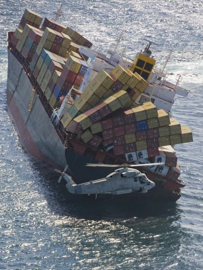 A cargo ship toppling over