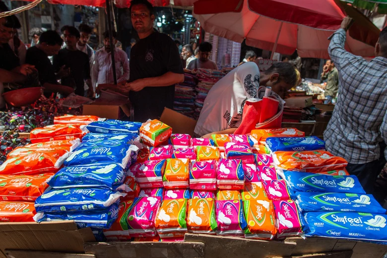 Old Delhi, India-Oct 7 2023: selling packets of sanitary pads from local company at Sadar Bazar Market