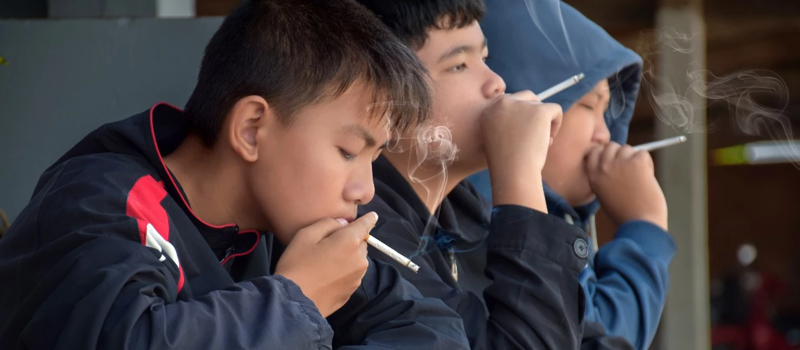  Teenage boys smoking