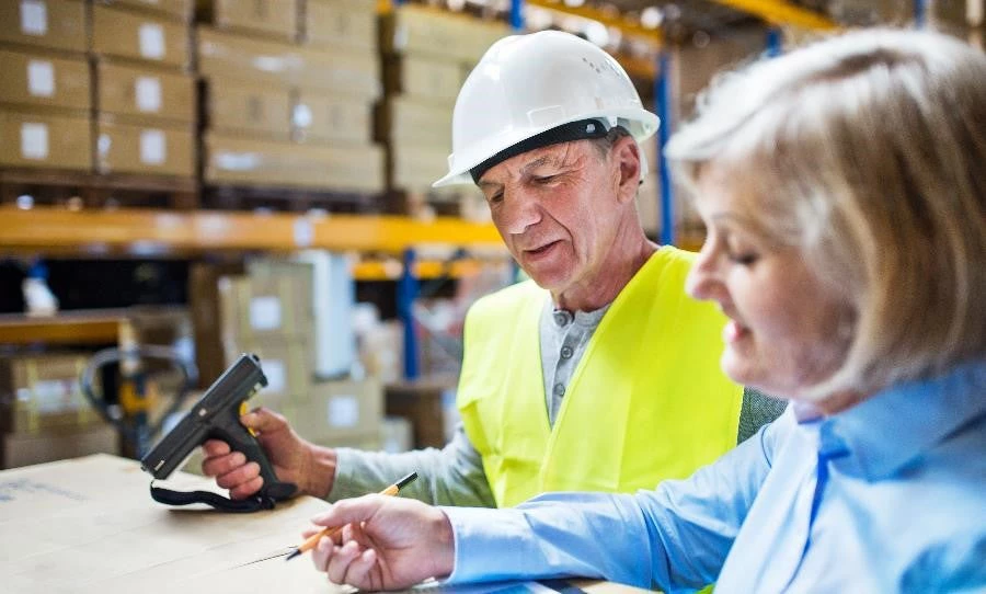 A man working in a warehouse. Photo: Halfpoint