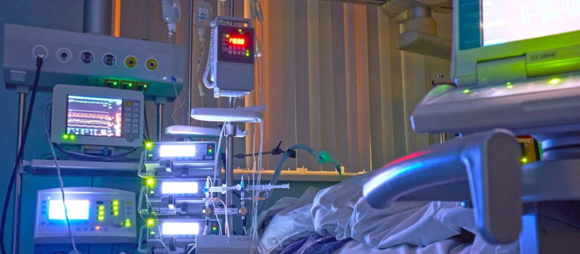 Glowing monitors in intensive care department. Nigth shift at icu, patient in critical state