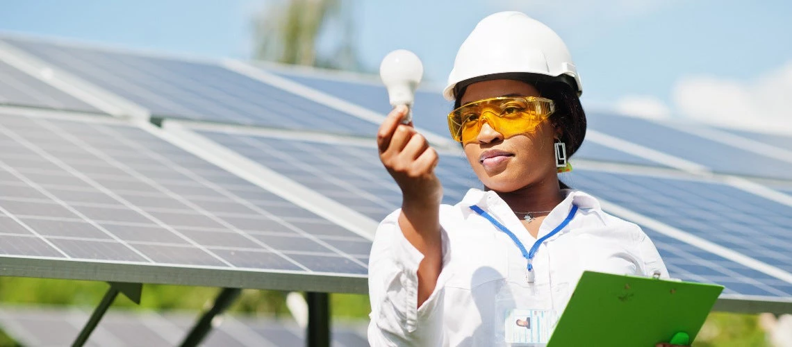 Technicians check the maintenance of solar panels.