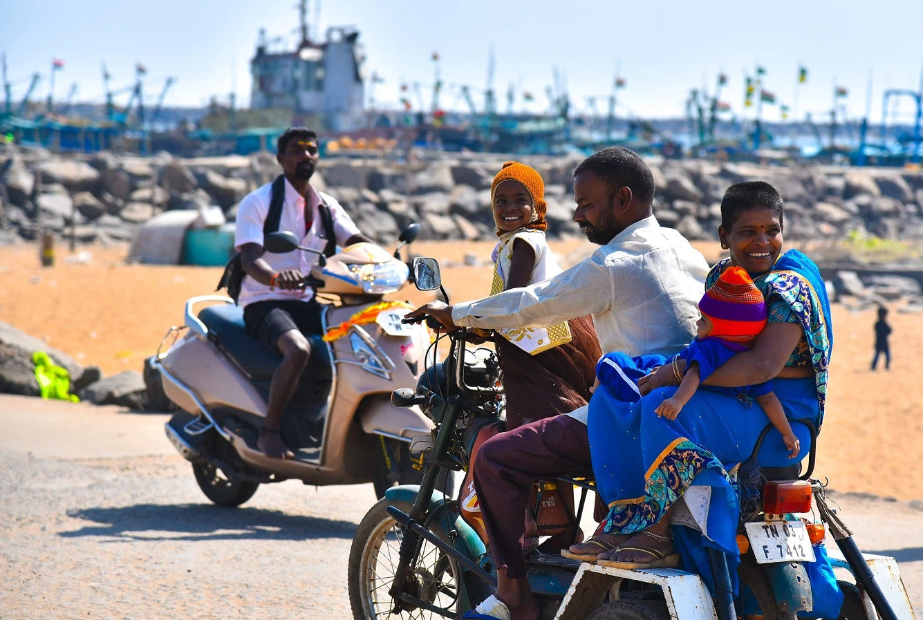A family of four members on a two-wheeler in Chennai, India.