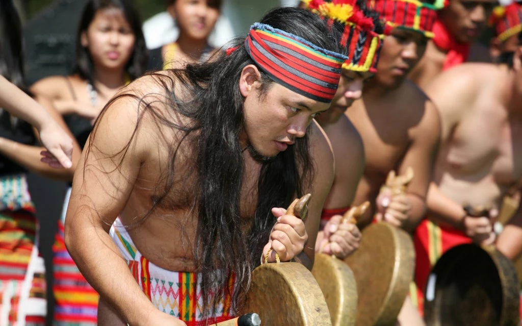 Performing an Igorot dance from the Philippines.