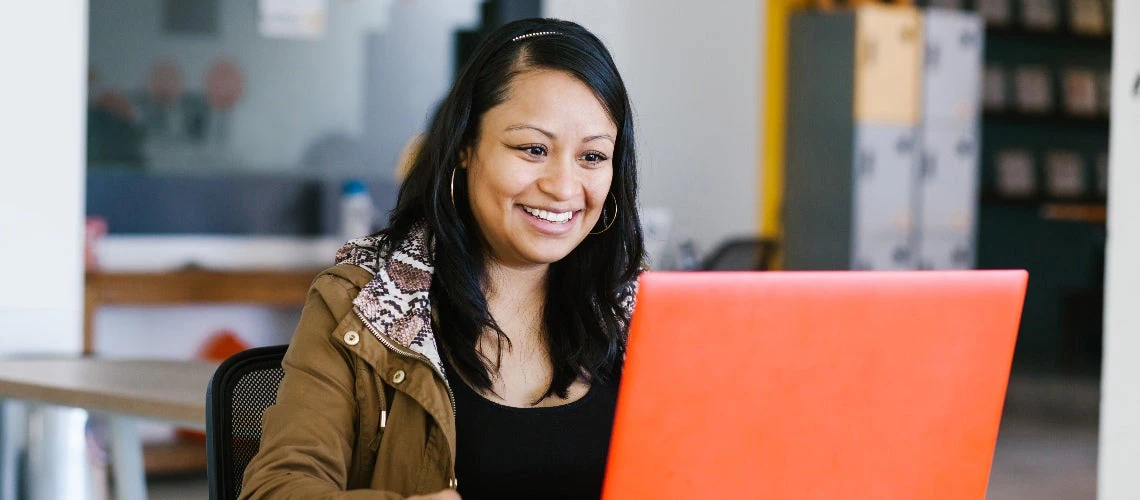 latin business woman working with computer at the office in Mexico city