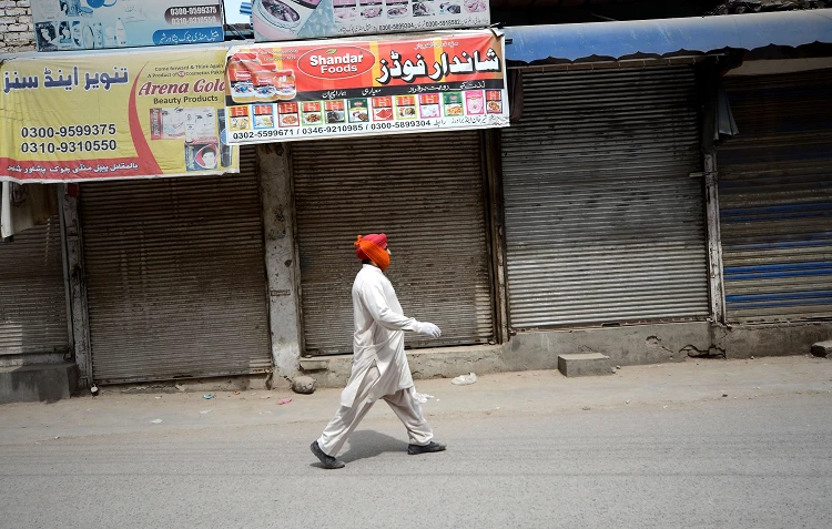 Storefronts in Peshawar, Khyber Pakhtunkhwa, Pakistan - April, 2020. Photo - Hussain Ali/ ?Pacific Press/? Shutterstock
