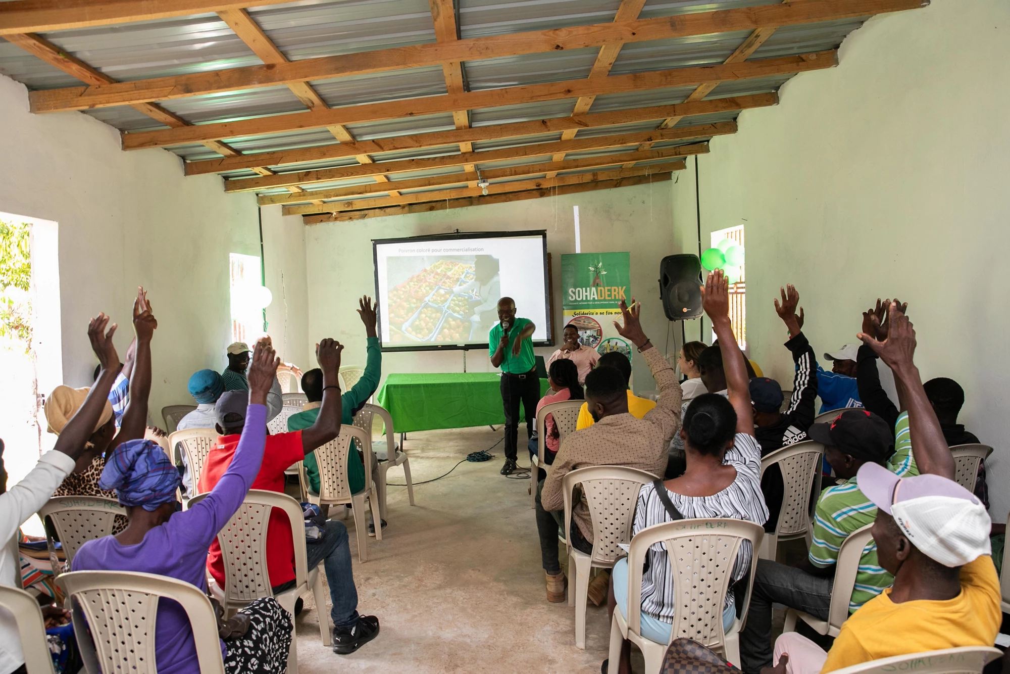 smallholder farmers receive receive training on post-harvest management, food safety, and proper storage and packaging 