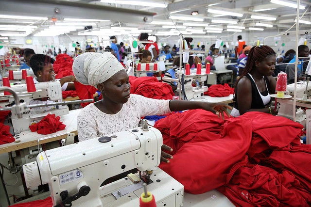 Dignity factory workers producing shirts for overseas clients, in Accra, Ghana