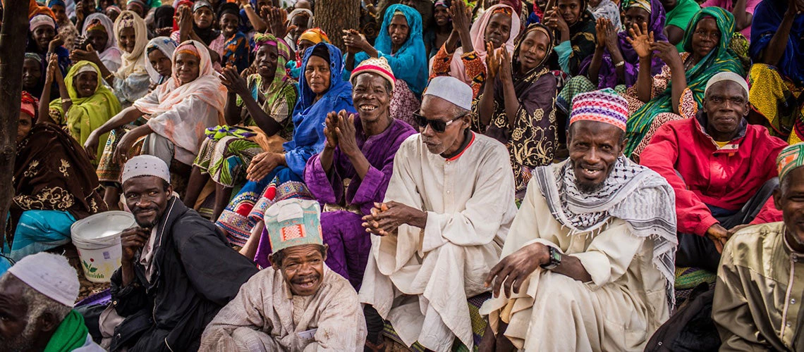 Hafia village, prefecture of Dalaba, Guinea. Villagers await to receive cash as part of a social net project  Photo: Vincent Tremeau /World Bank