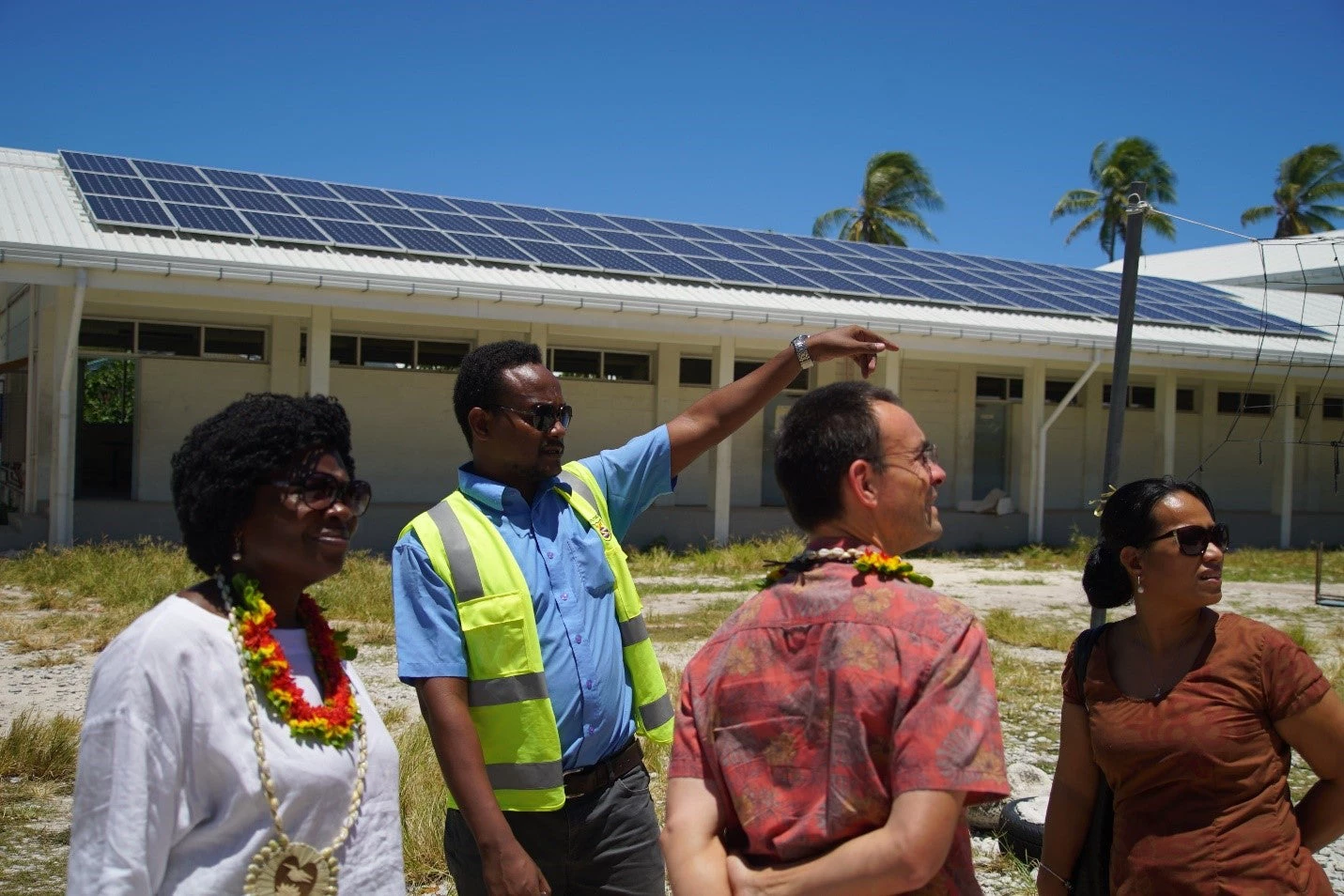 Visiting a Bank solar project site with VP Kwakwa, former Country Director Kerf and the Solar Project Manager 
