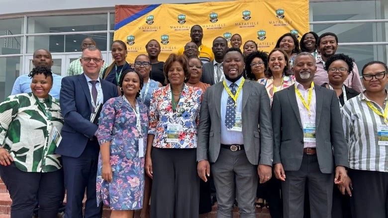 World Bank Country Director for South Africa Marie Francoise Marie-Nelly and Matatiele Mayor Sonwabile Mngenela (center) with mission participants following a town hall meeting which included presentations from the World Bank, local farmers, agri-prenuers, and private sector and community members.