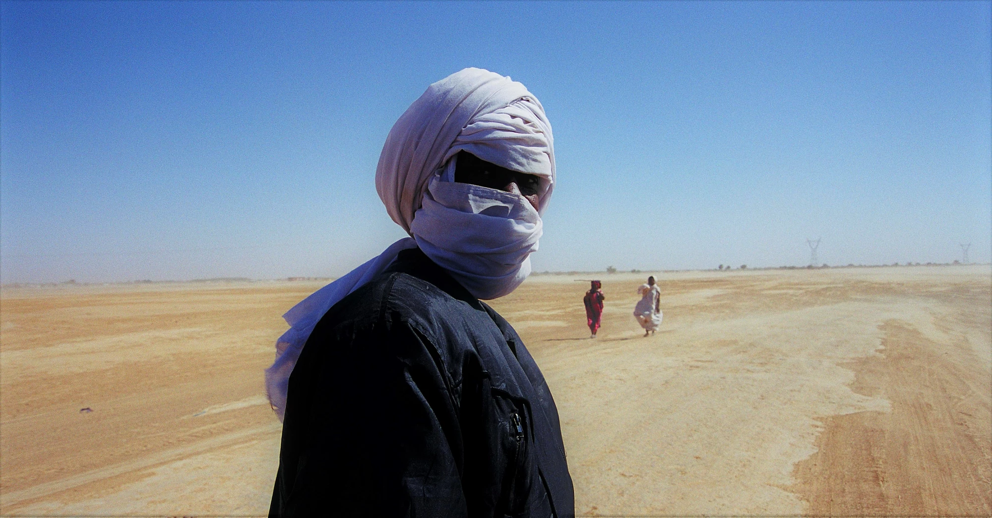 Les habitants du sud de la Mauritanie portent des vêtements qui les protègent contre les fréquentes tempêtes de poussière au Sahel. Mauritanie. Photo : © Scott Wallace/Banque mondiale