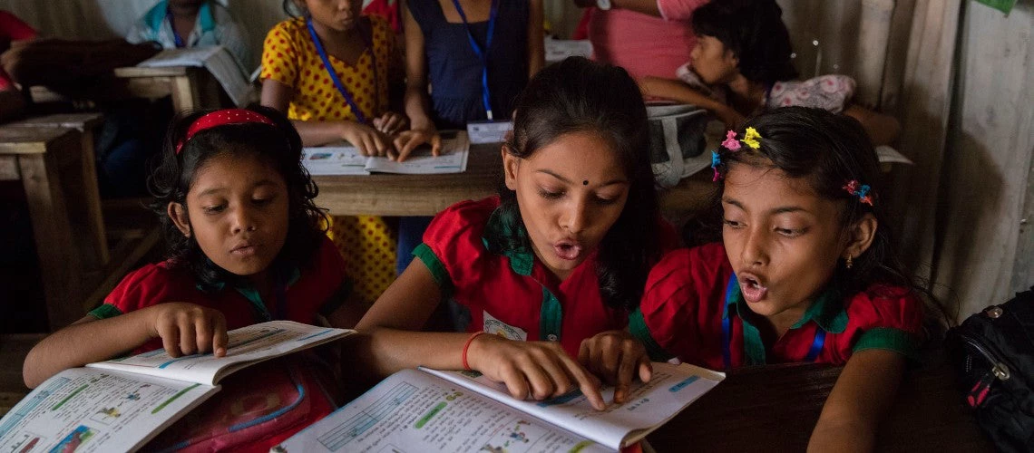 Students participate in class while listing to class teacher at the Sujat Nagar urban slum school in Dhaka, Bangladesh on October 11, 2016. 