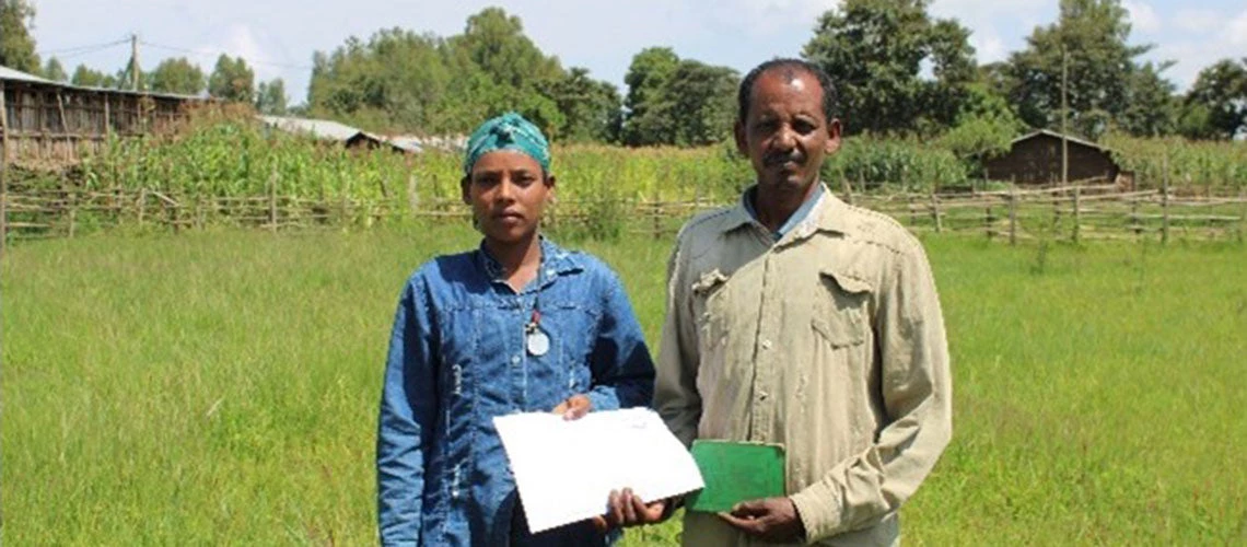 Addise Grimaw and Abi Alamirew, a small holder farming couple, from Dangla Woreda of Amhara Region with their certification for second level landholding.  Photo: CALM Program, Ethiopia Ministry of Agriculture