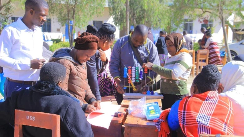 Preprimary teachers develop locally made teaching and learning materials during a teacher training. Photo: Magreth Mziray/World Bank