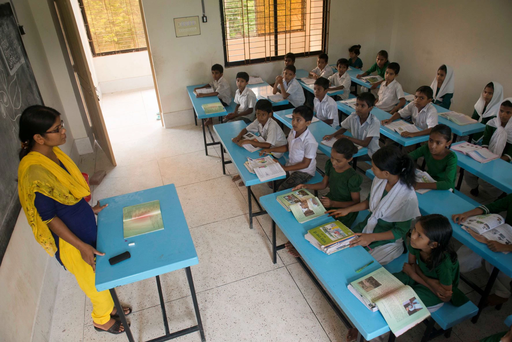 teacher in Bangladesh classroom 