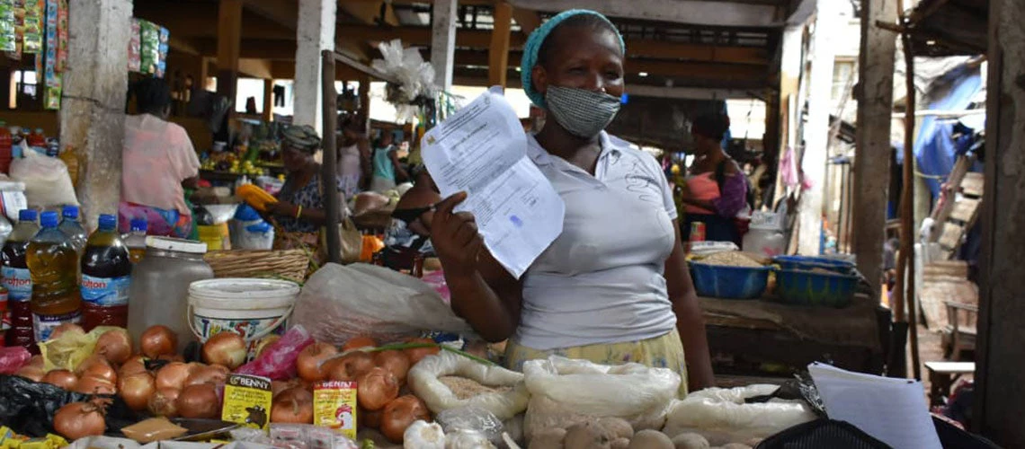 One of the beneficiaries of the COVID-19 Emergency Cash Transfer Program. Sierra Leone. Photo: National Commission for Social Action (NaCSA)