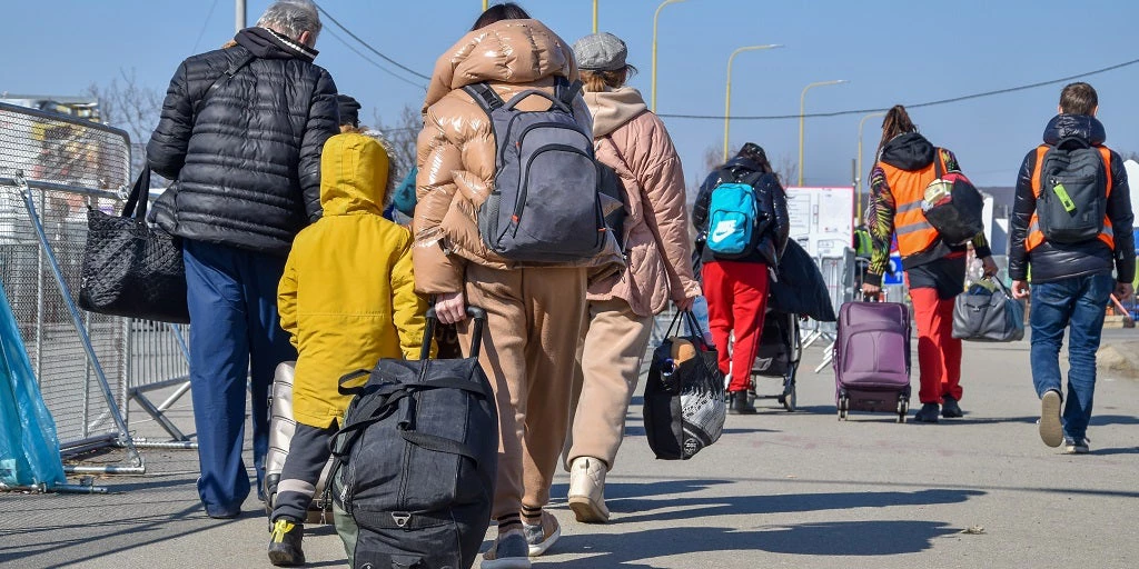 Refugees from Ukraine on the border with Slovakia. Photo: Vanja Stokic / Shutterstock