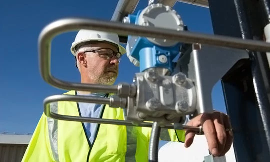  National Renewable Energy Laboratory engineer Tim Wendelin tests techniques for solar energy storage at a testing facility in Colorado. Dennis Schroeder / NREL