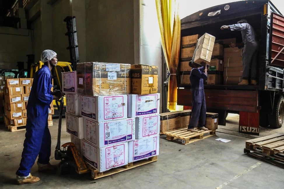 Delivering vaccine supplies in Kenya. 
