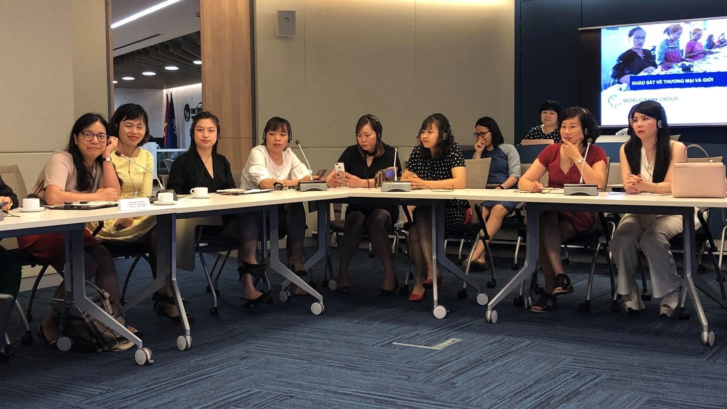 Focus group participants sit around a table.