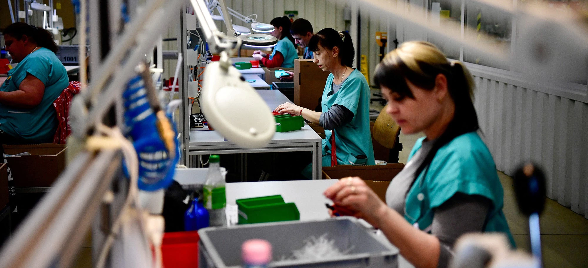 Ukranian refugees work at a German industrial sensor factory in Veszprem, Hungary, 2022. REUTERS/Marton Monus/File Photo