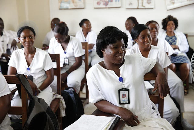 Nurses listen during a training program to learn more about child and adolescent mental health in Monrovia, Liberia