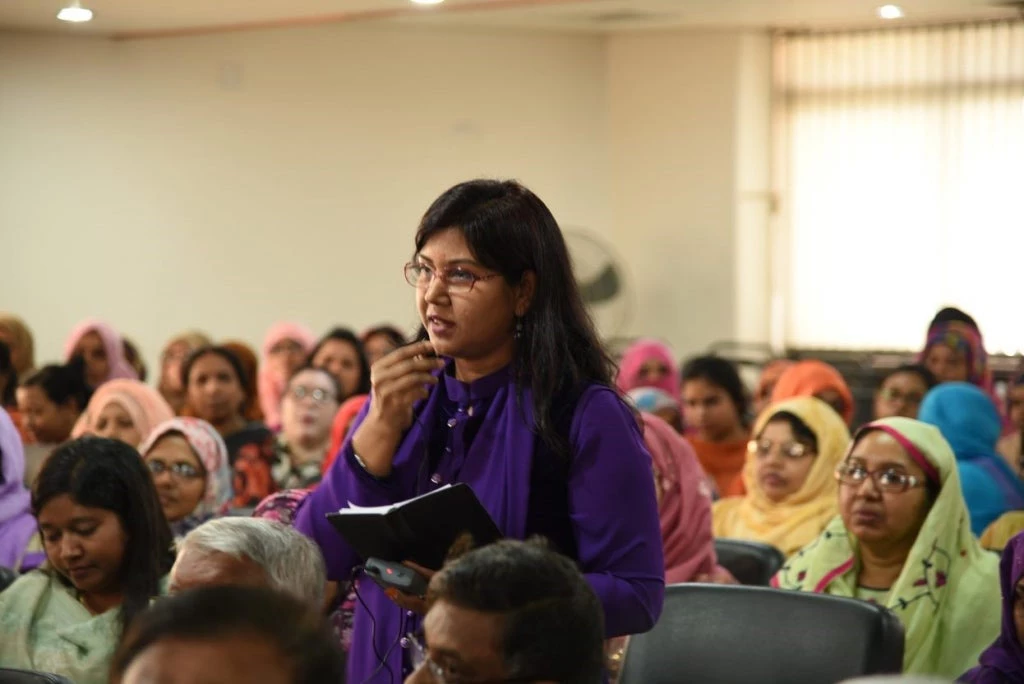 Female staff sharing feedback at the Women?s Day event in Dhaka, March 2020. Photo: BREB